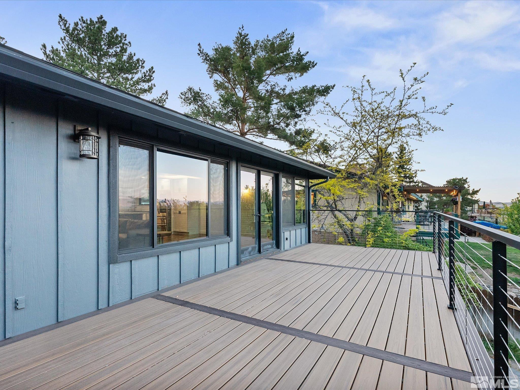2036 Breen Drive Reno, NV 89509 - Photo 28 of 38 a view of backyard with a deck and wooden floor
