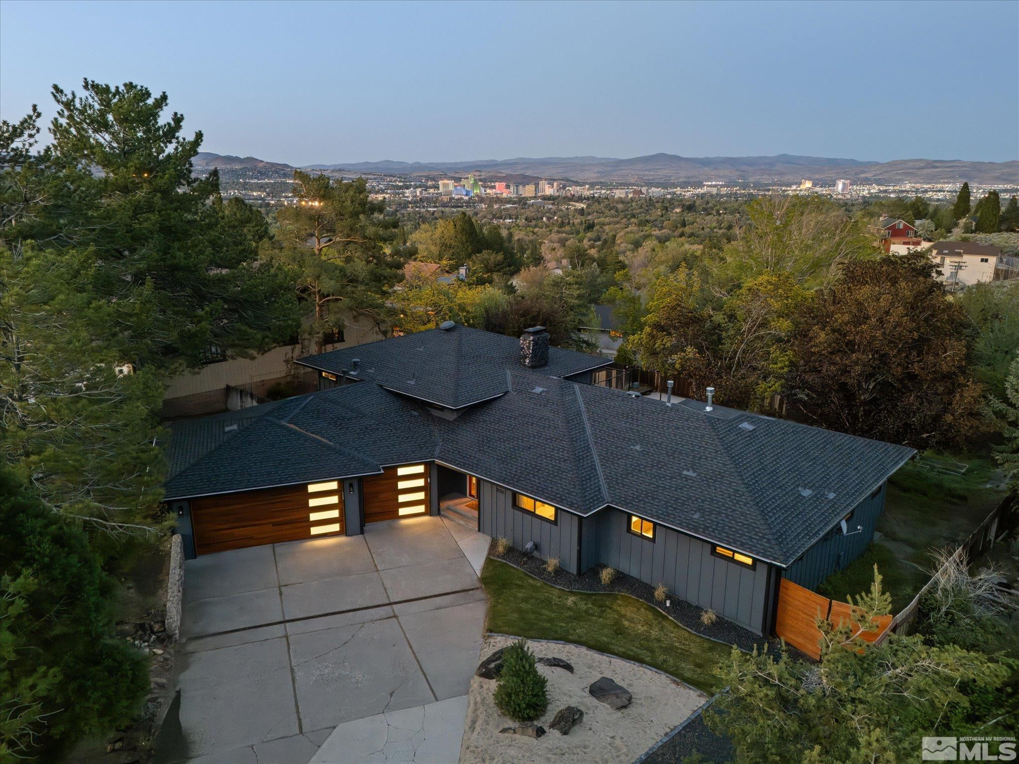 2036 Breen Drive Reno, NV 89509 - Photo 35 of 38 an aerial view of a house with a mountain view