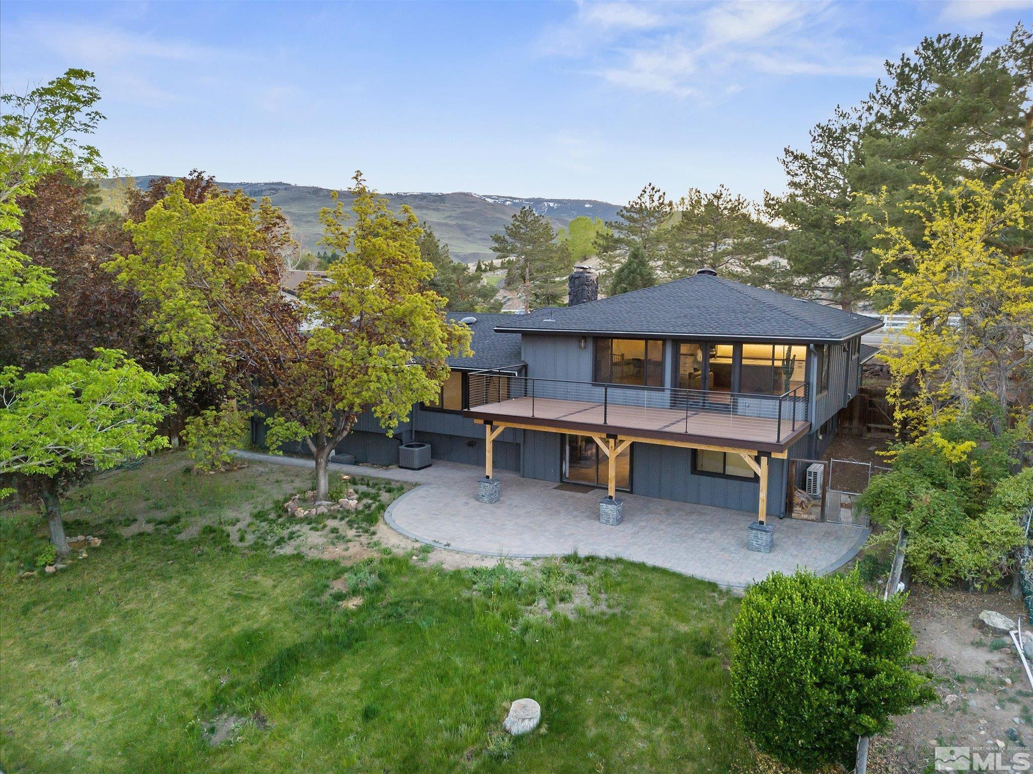 2036 Breen Drive Reno, NV 89509 - Photo 37 of 38 a view of a house with backyard porch and sitting area