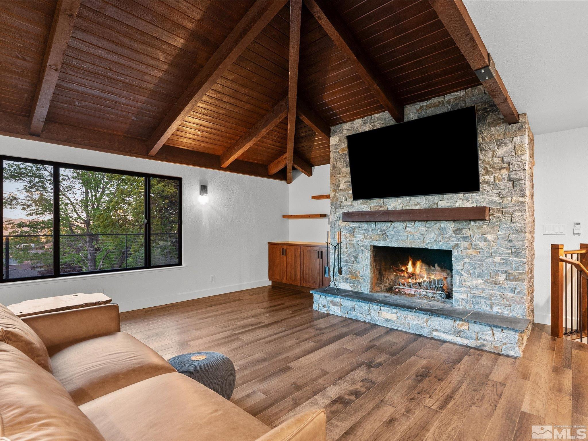 2036 Breen Drive Reno, NV 89509 - Photo 9 of 38 a living room with furniture and a fireplace