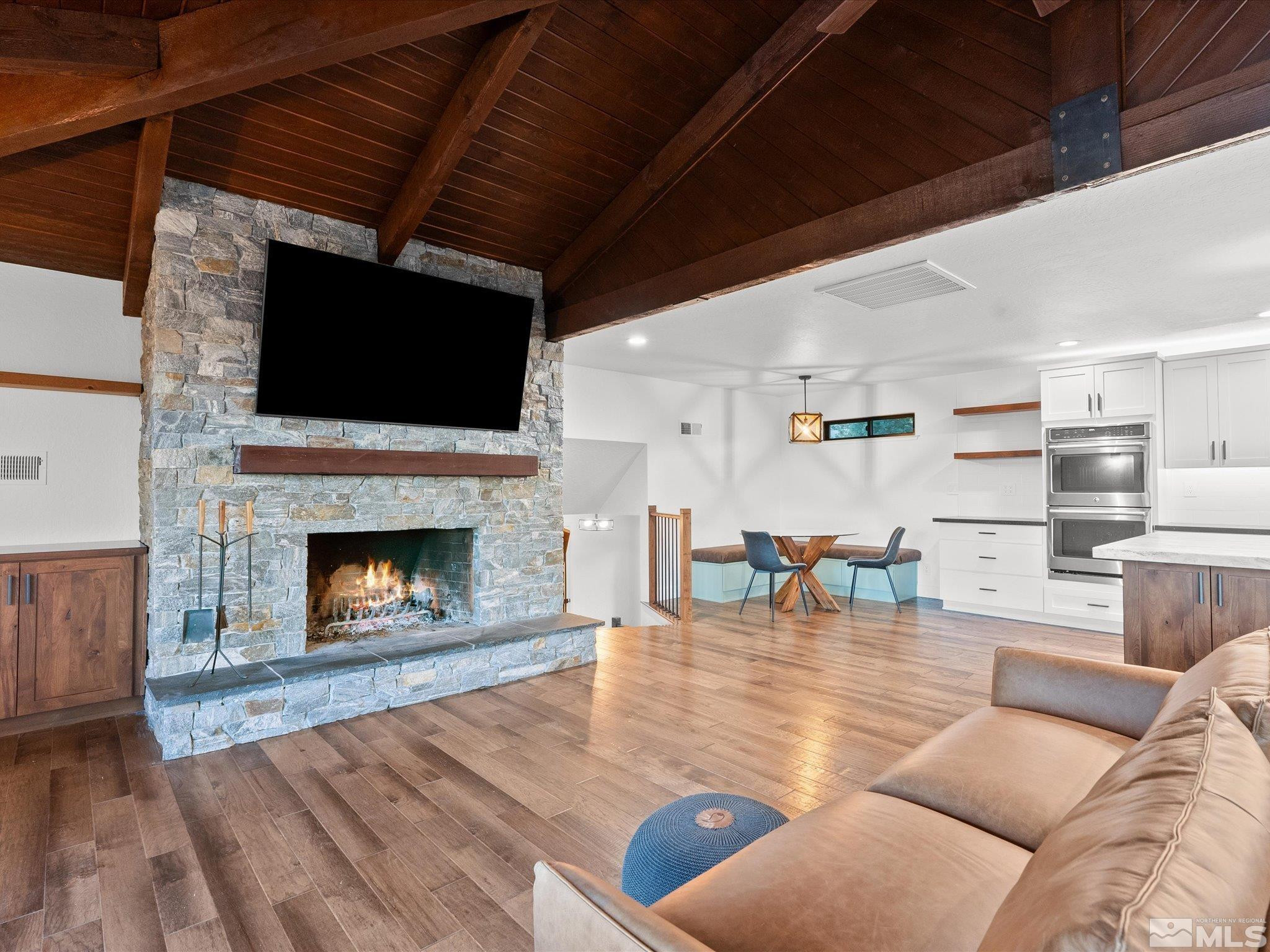 2036 Breen Drive Reno, NV 89509 - Photo 10 of 38 a living room with furniture and a fireplace or television