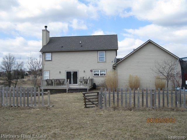 1264 North Hacker Road Howell, MI 48843 - Photo 14 of 14 Rear View