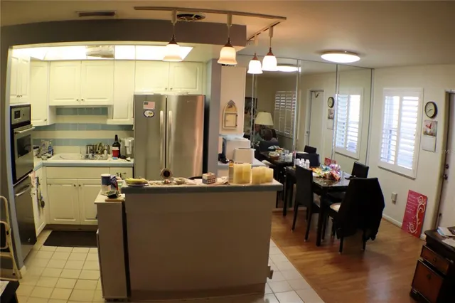a view of a dining table and chairs in a room