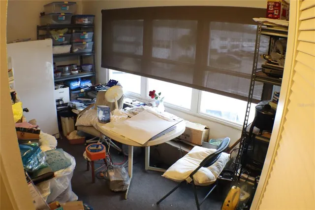 a view of barbecue area with seating area