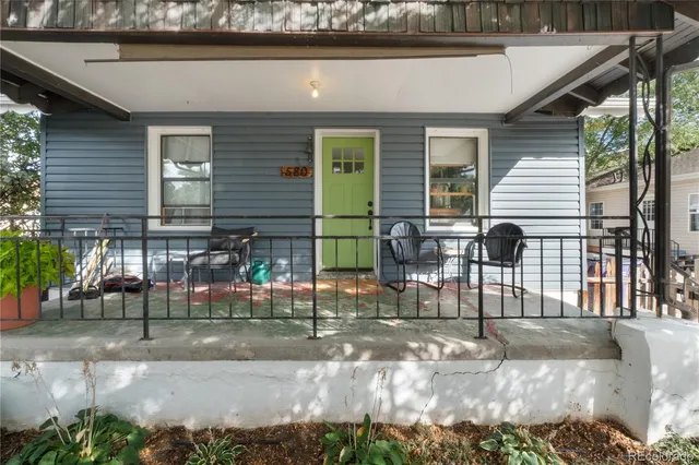 a view of outdoor space and front view of a house