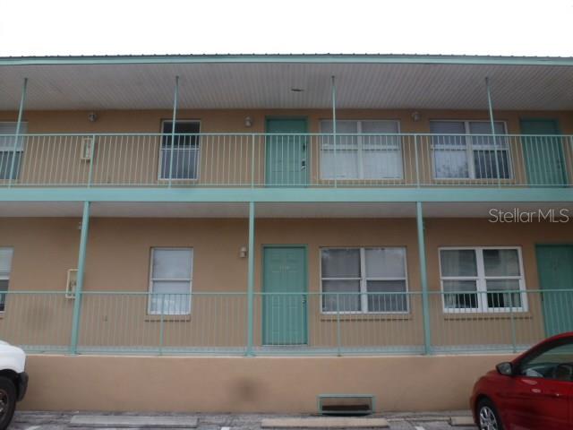 5822 Congress Street, Unit 206 New Port Richey, FL 34653 - Photo 1 of 1 a front view of a house with a yard