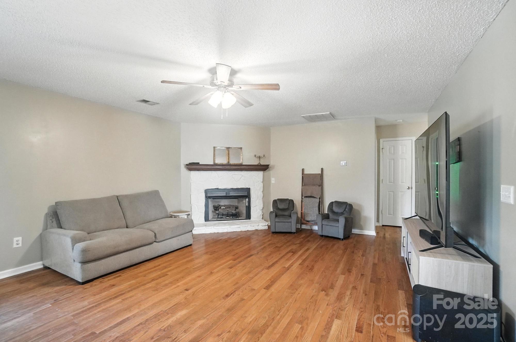 1116 State Rd S-29-770 Kershaw, SC 29067 - Photo 16 of 48 a living room with furniture and a fireplace