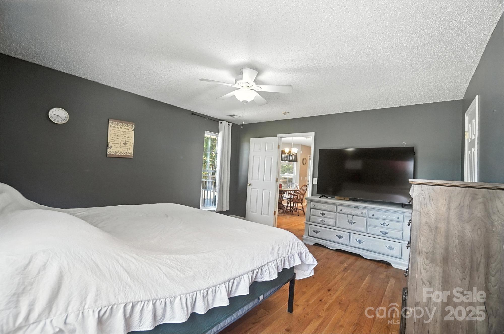 1116 State Rd S-29-770 Kershaw, SC 29067 - Photo 23 of 48 a bedroom with a bed and a flat screen tv