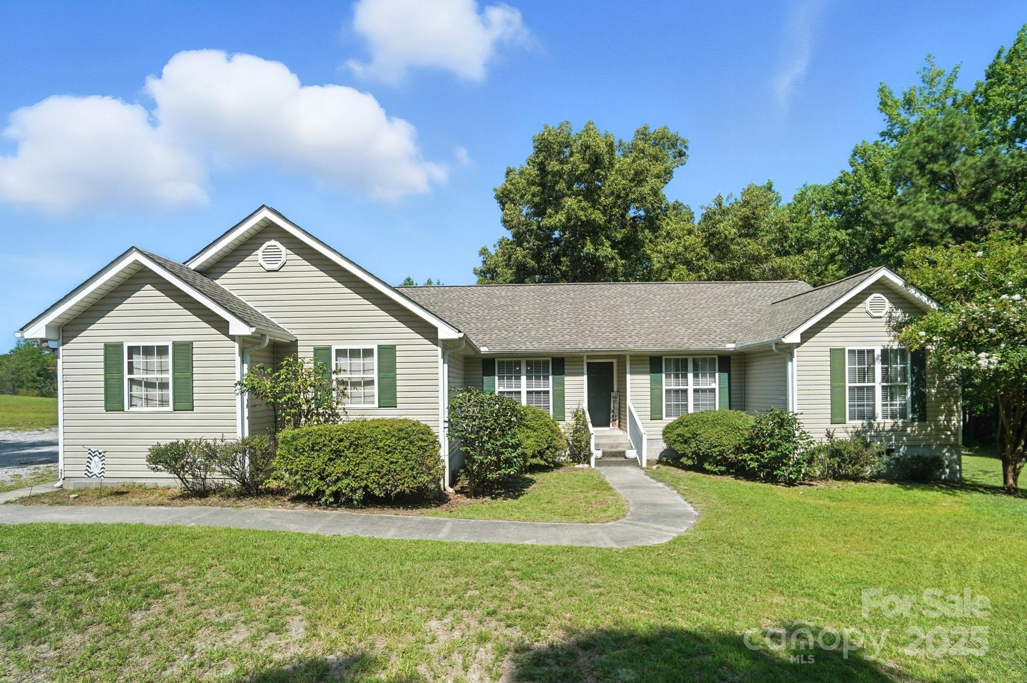 1116 State Rd S-29-770 Kershaw, SC 29067 - Photo 3 of 48 a front view of house with yard and green space