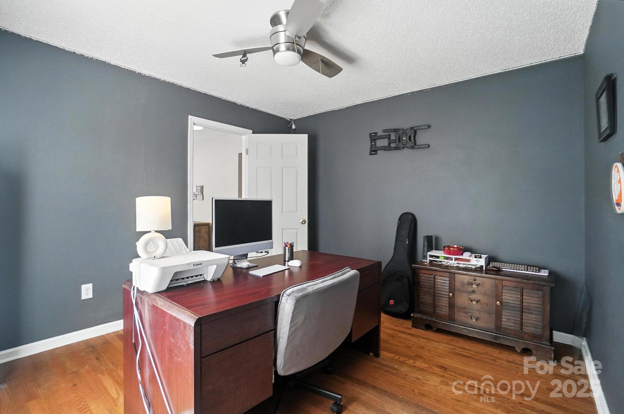 1116 State Rd S-29-770 Kershaw, SC 29067 - Photo 32 of 48 a room with furniture and wooden floor