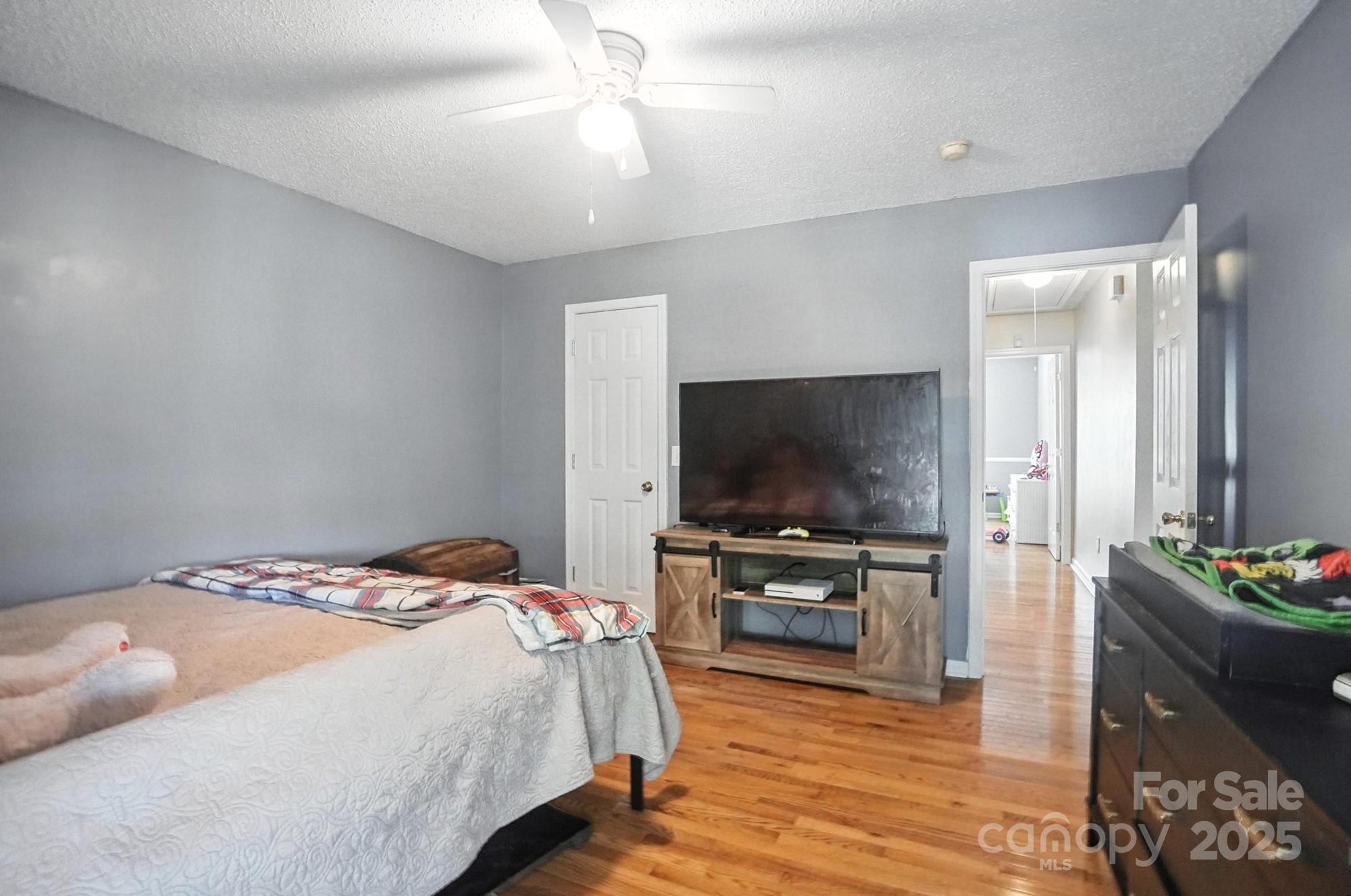 1116 State Rd S-29-770 Kershaw, SC 29067 - Photo 34 of 48 a bedroom with a bed and a flat screen tv