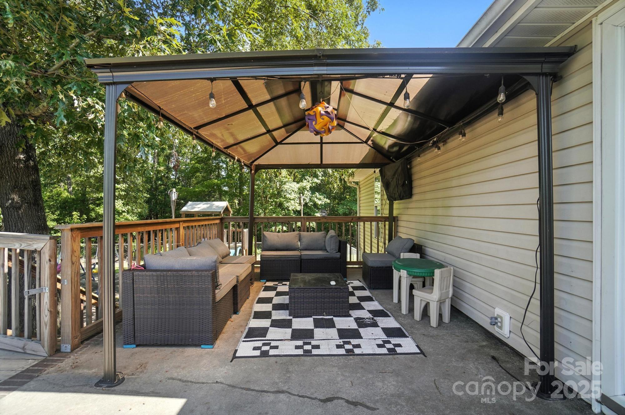 1116 State Rd S-29-770 Kershaw, SC 29067 - Photo 39 of 48 a view of porch with chairs and wooden fence
