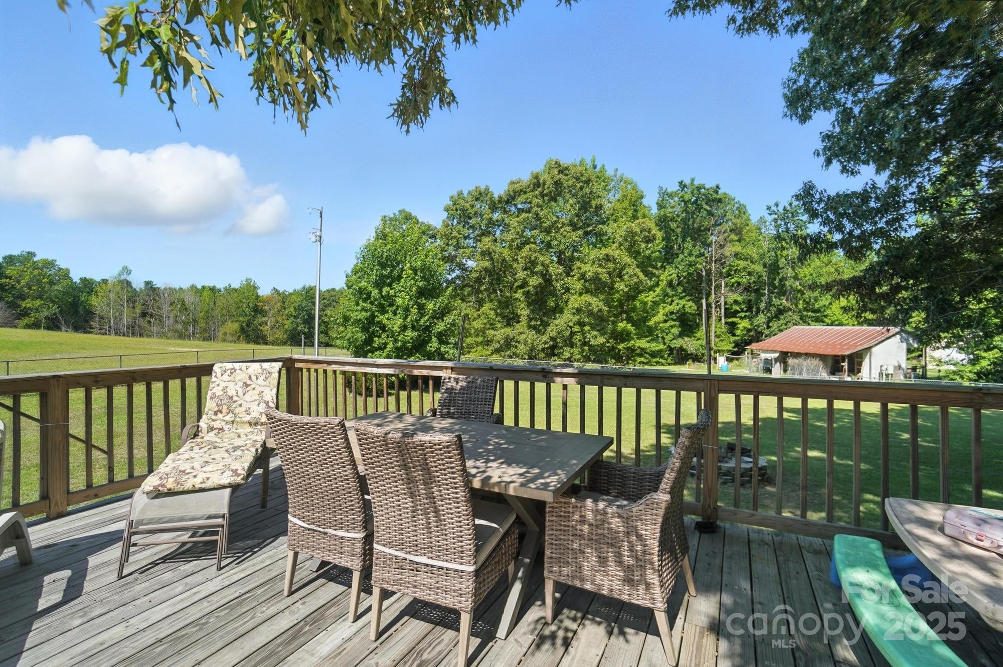 1116 State Rd S-29-770 Kershaw, SC 29067 - Photo 43 of 48 a view of a chairs on wooden deck
