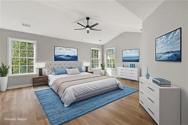 a bathroom with a double vanity sink mirror and