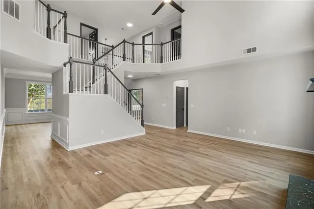 a kitchen with refrigerator cabinets and a sink