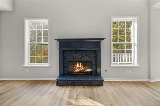 a kitchen with stainless steel appliances granite countertop refrigerator sink and microwave