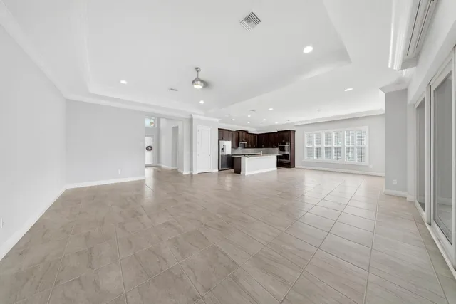 a view of walk in closet with clothes