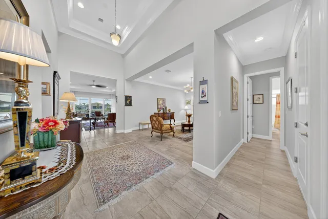 a view of empty room with floor to ceiling window and outdoor view