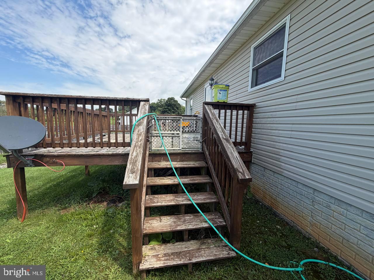 333 East Bailey Road Lewisburg, WV 24901 - Photo 15 of 57 Charming deck entrance with lush greenery.