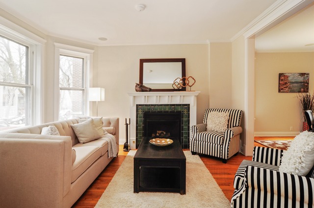 1457 West Rascher Avenue Chicago, IL 60640 - Photo 2 of 22 a living room with furniture and a fireplace