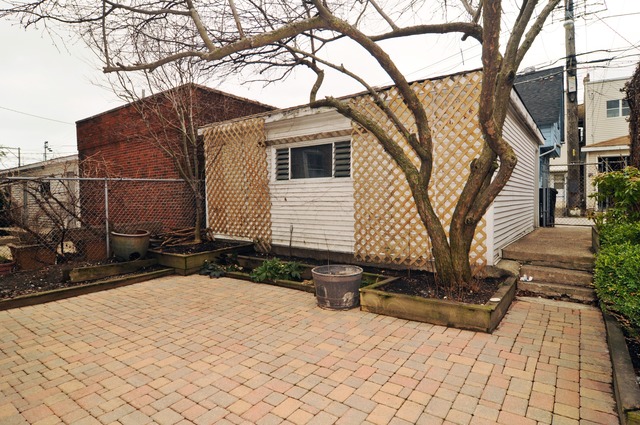 1457 West Rascher Avenue Chicago, IL 60640 - Photo 19 of 22 a front view of a house