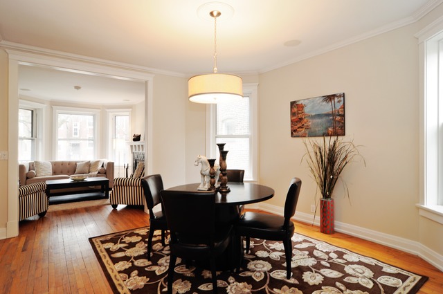 1457 West Rascher Avenue Chicago, IL 60640 - Photo 4 of 22 a living room with furniture and a wooden floor