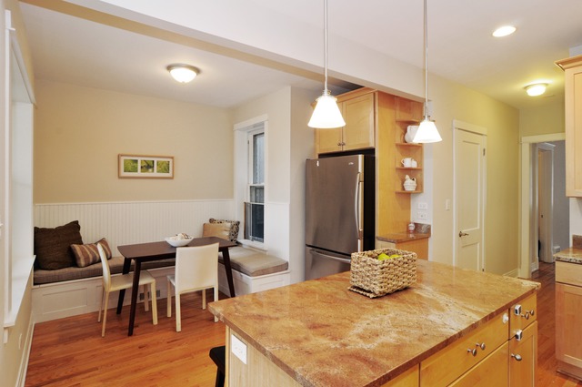 1457 West Rascher Avenue Chicago, IL 60640 - Photo 6 of 22 a kitchen with a table and chairs in it