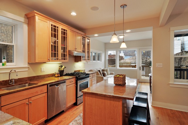 1457 West Rascher Avenue Chicago, IL 60640 - Photo 7 of 22 a kitchen with a sink stove and wooden floor