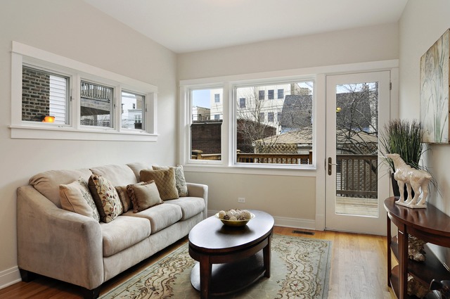 1457 West Rascher Avenue Chicago, IL 60640 - Photo 8 of 22 a living room with furniture and a potted plant