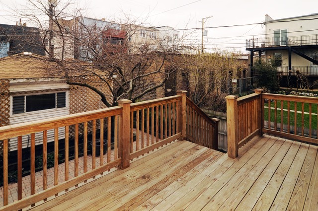1457 West Rascher Avenue Chicago, IL 60640 - Photo 9 of 22 a balcony with wooden floor