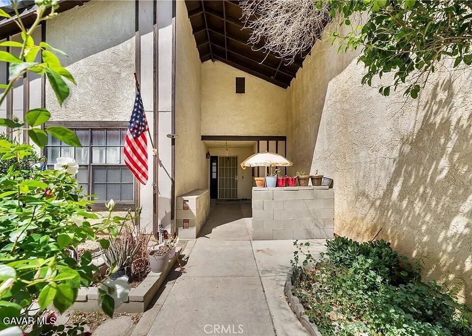 45109 18th Street West Lancaster, CA 93534 - Photo 2 of 9 a front view of a house with outdoor space