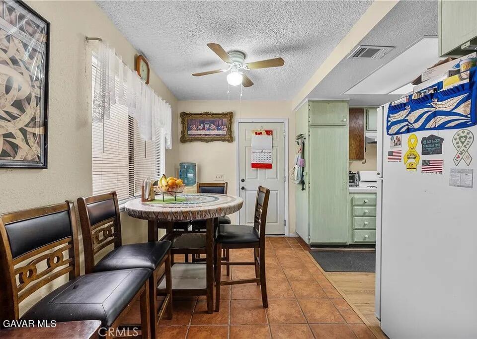 45109 18th Street West Lancaster, CA 93534 - Photo 5 of 9 a dining room with furniture and window