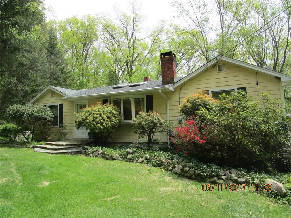 6 Pine Hill Road New Fairfield, CT 06812 - Photo 1 of 1 a front view of house with a garden
