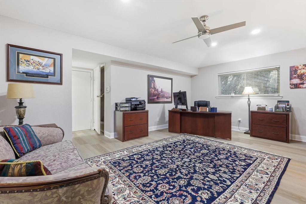 4208 Bretton Bay Circle Dallas, TX 75287 - Photo 12 of 32 a bed room with furniture and a couch