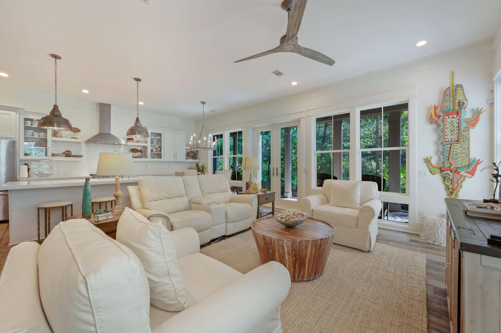 295 Matt's Way Santa Rosa Beach, FL 32459 - Photo 1 of 48 a living room with furniture fireplace and large windows