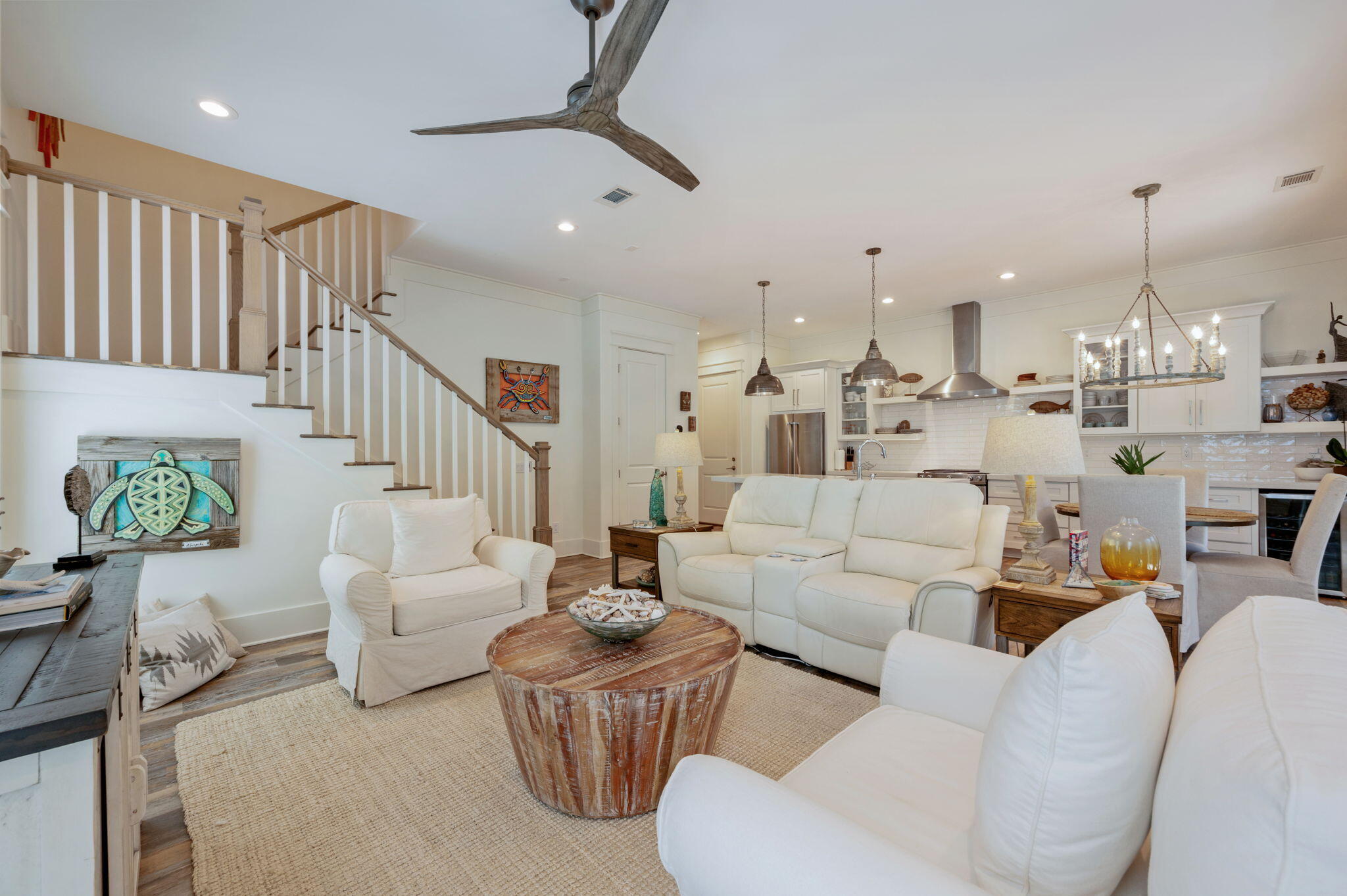 295 Matt's Way Santa Rosa Beach, FL 32459 - Photo 16 of 48 a living room with furniture kitchen view and a chandelier