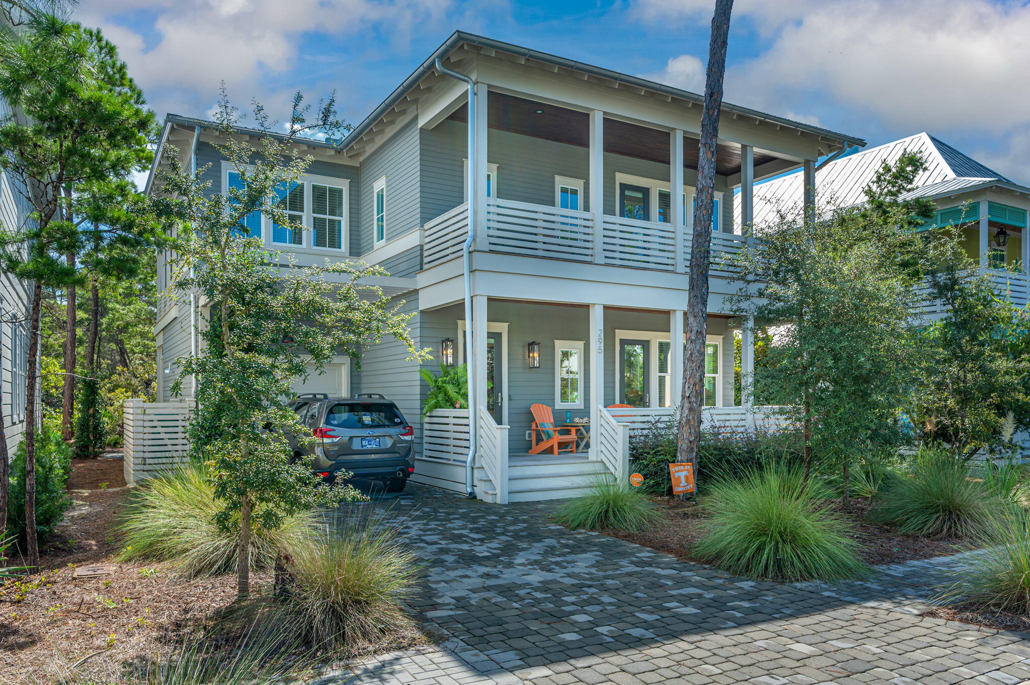 295 Matt's Way Santa Rosa Beach, FL 32459 - Photo 2 of 48 a front view of a house with garden