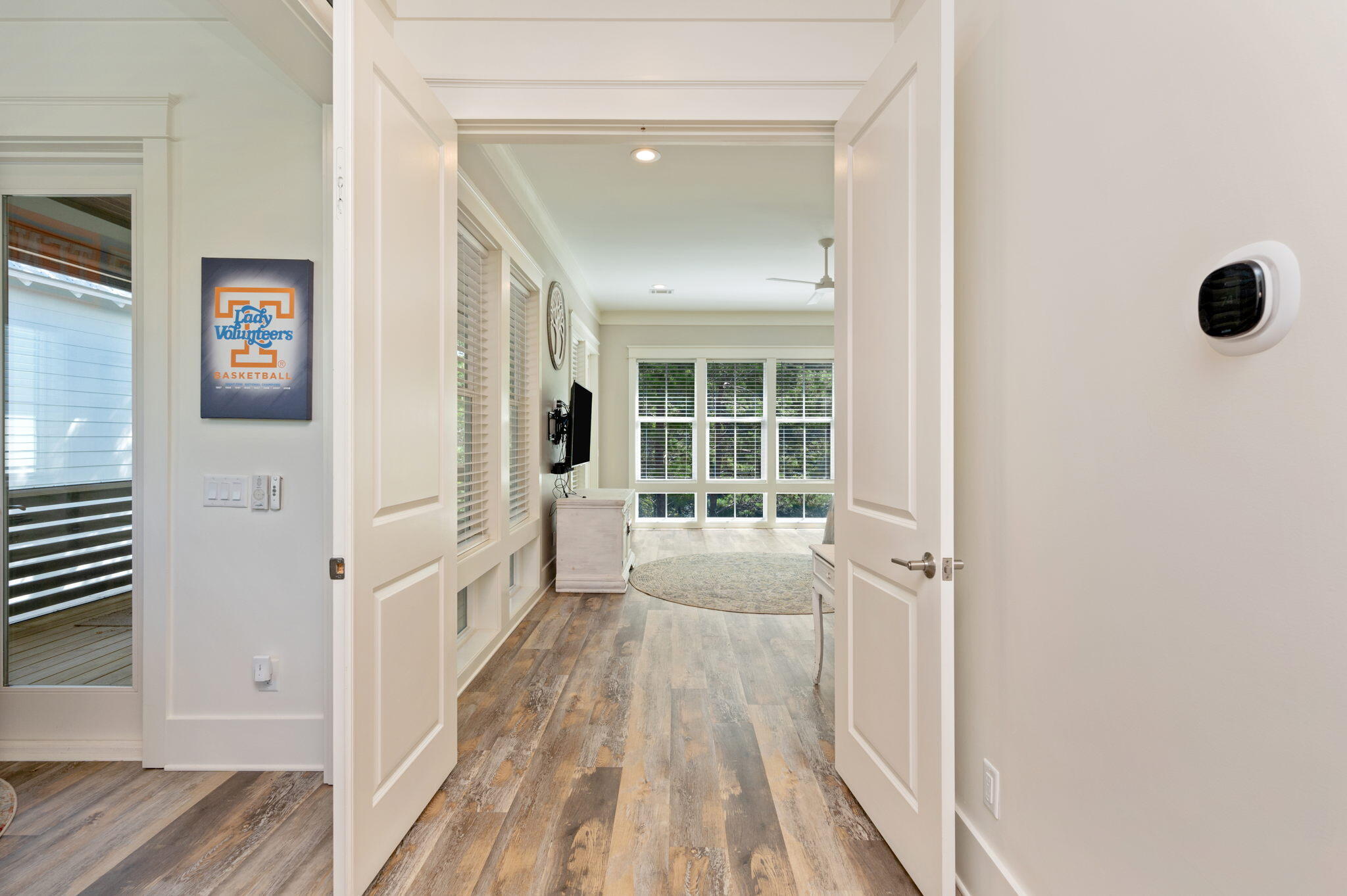 295 Matt's Way Santa Rosa Beach, FL 32459 - Photo 29 of 48 a view of a hallway with wooden floor and staircase