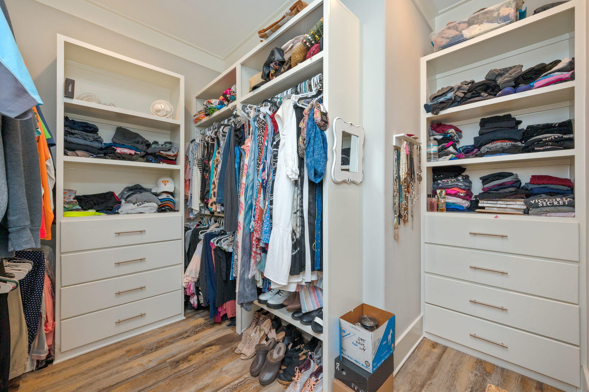 295 Matt's Way Santa Rosa Beach, FL 32459 - Photo 33 of 48 a view of walk in closet with clothes