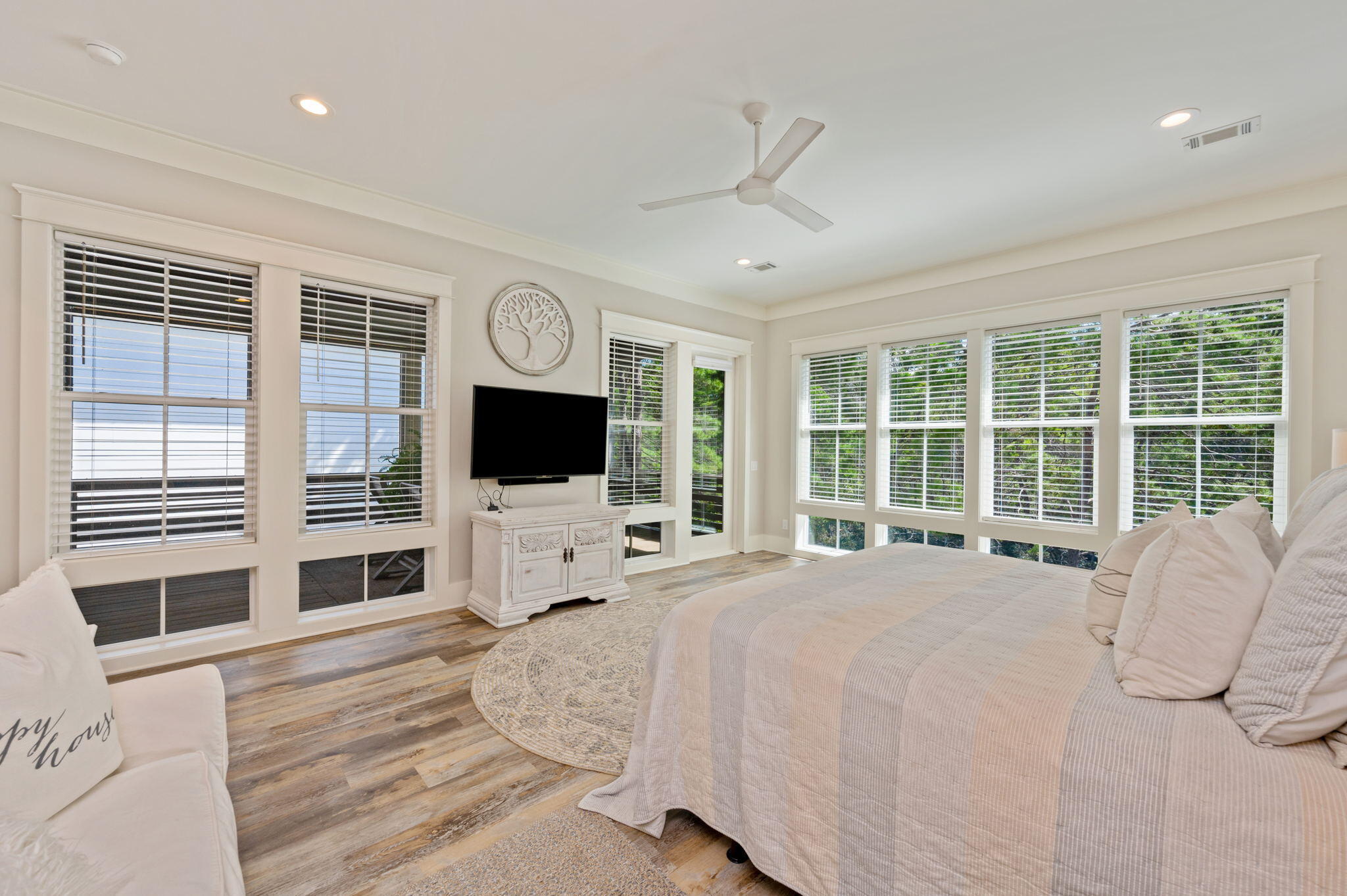 295 Matt's Way Santa Rosa Beach, FL 32459 - Photo 34 of 48 a large bedroom with a bed flat screen tv and a large window
