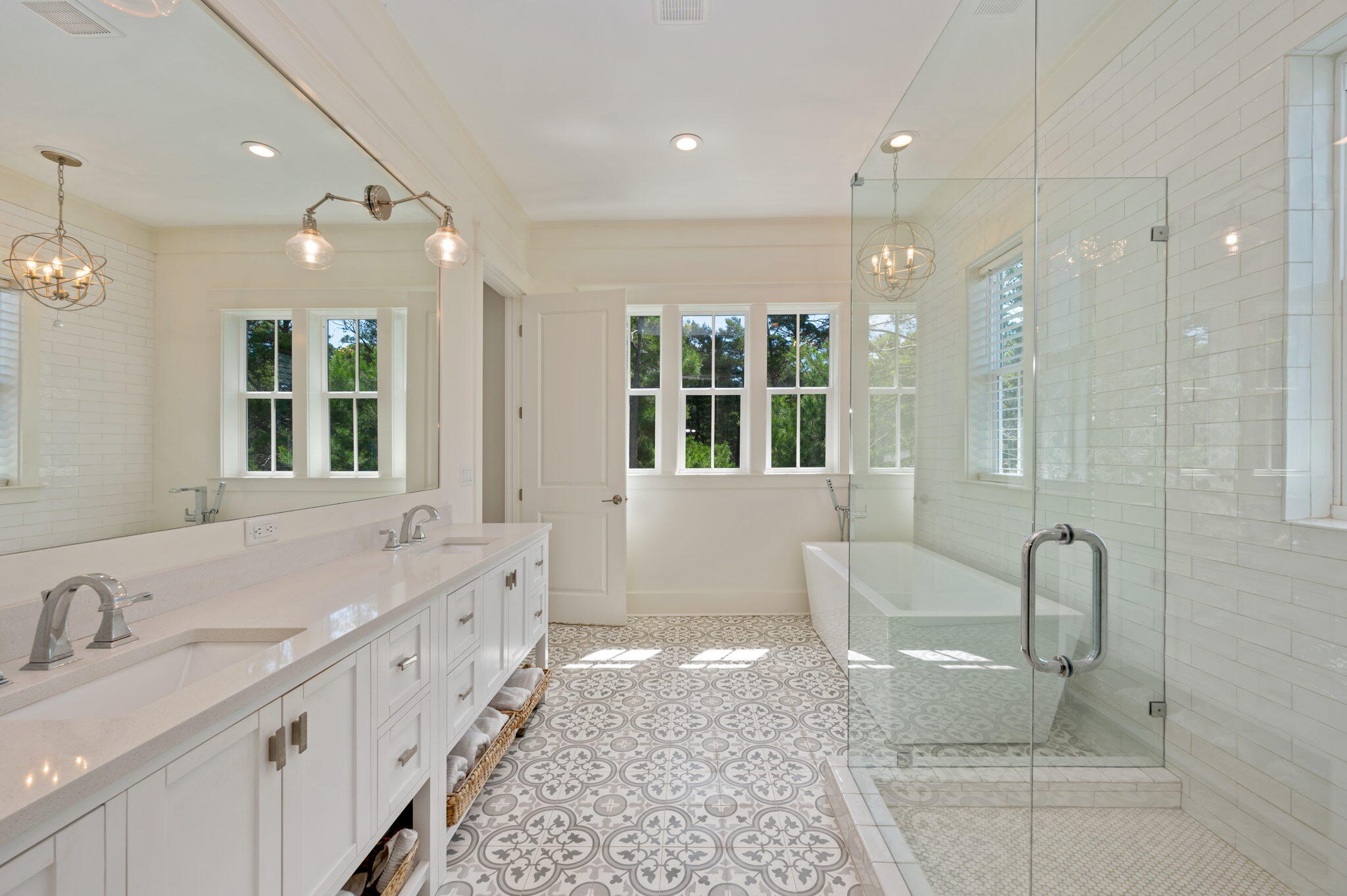 295 Matt's Way Santa Rosa Beach, FL 32459 - Photo 38 of 48 a bathroom with double vanity sinks a large mirror and shower