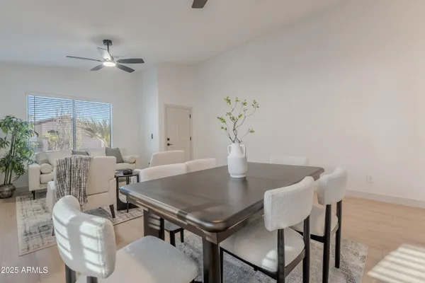 a view of a dining room with furniture