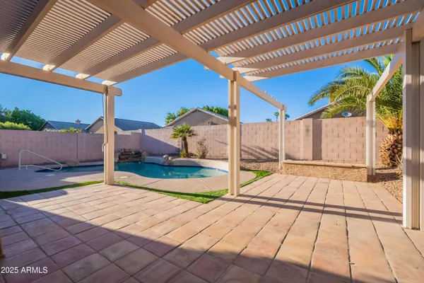 a view of a backyard of a house