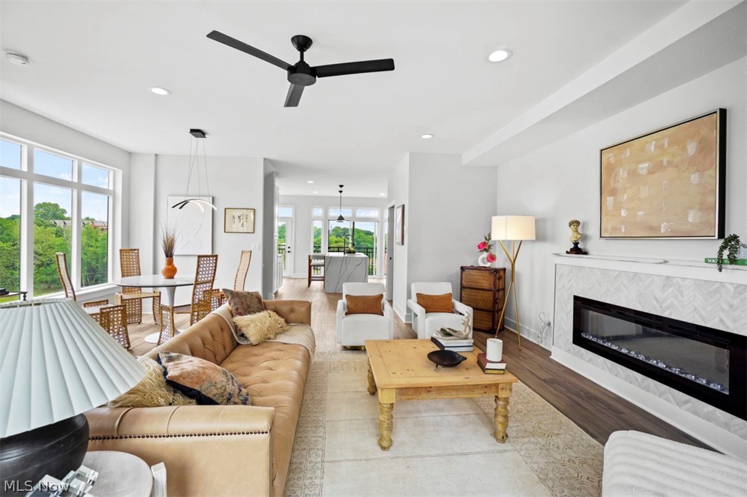 2291 West 19th Street Cleveland, OH 44113 - Photo 2 of 47 Living room with hardwood / wood-style flooring and ceiling fan