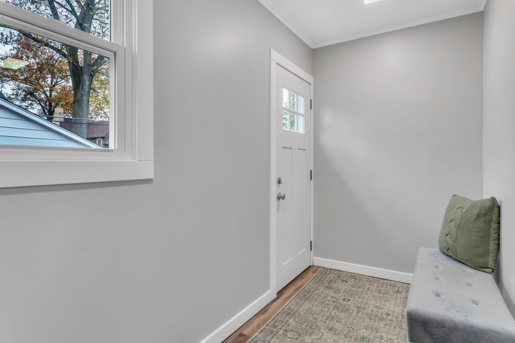 34 Brunswick Street Springfield, MA 01108 - Photo 17 of 31 a view of entryway with window and hallway