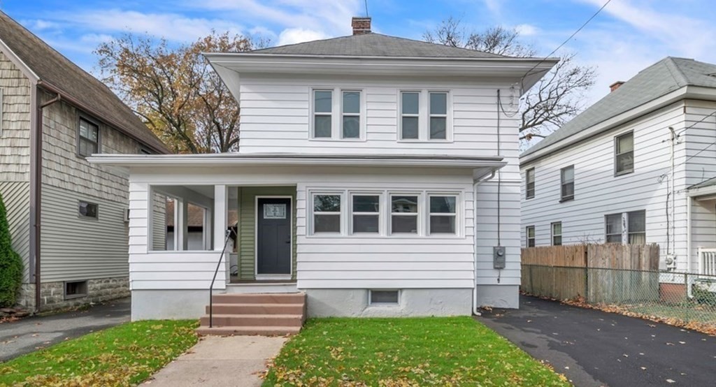 34 Brunswick Street Springfield, MA 01108 - Photo 2 of 31 a front view of a house with garden
