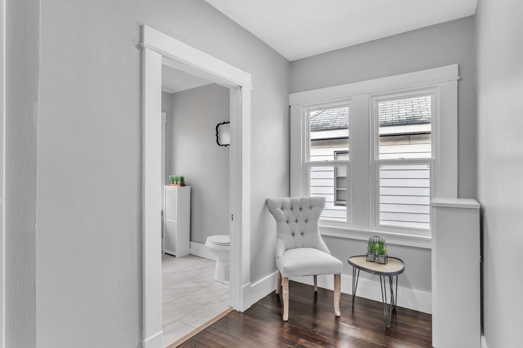 34 Brunswick Street Springfield, MA 01108 - Photo 22 of 31 a view of a room with wooden floor and windows