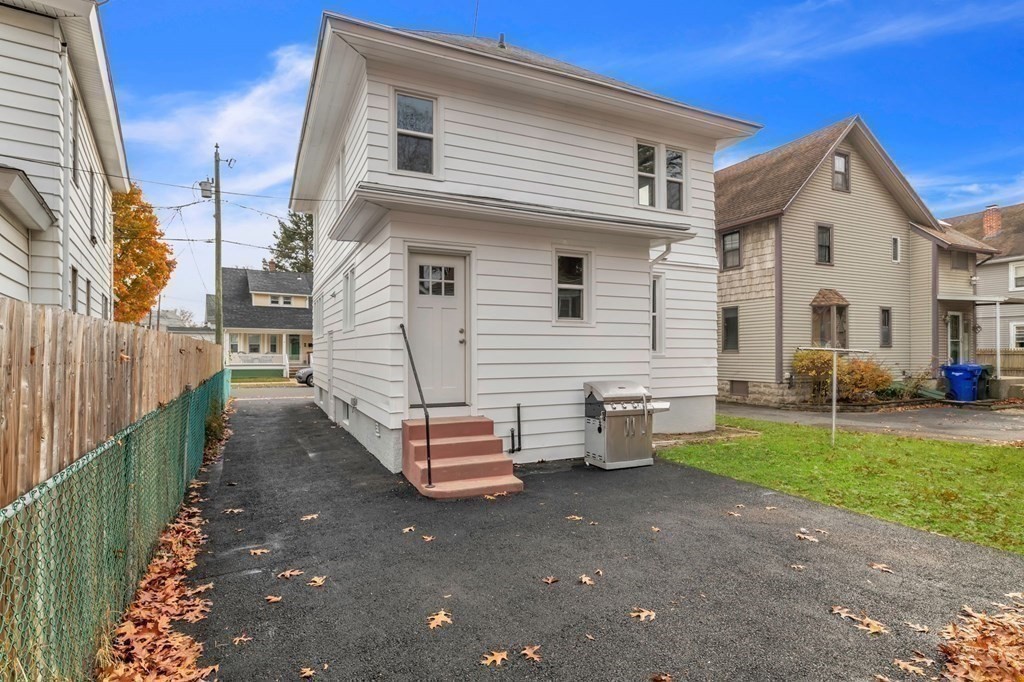 34 Brunswick Street Springfield, MA 01108 - Photo 28 of 31 a view of a house with backyard and sitting area