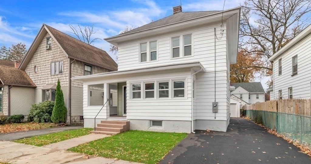 34 Brunswick Street Springfield, MA 01108 - Photo 31 of 31 a front view of a house with a yard
