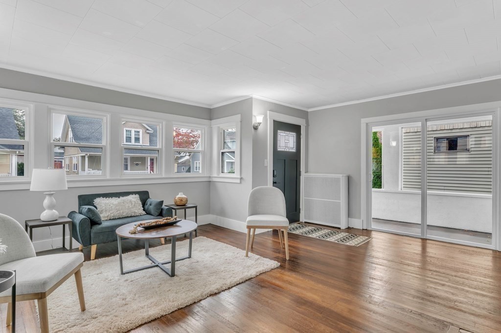 34 Brunswick Street Springfield, MA 01108 - Photo 5 of 31 a living room with furniture and wooden floor